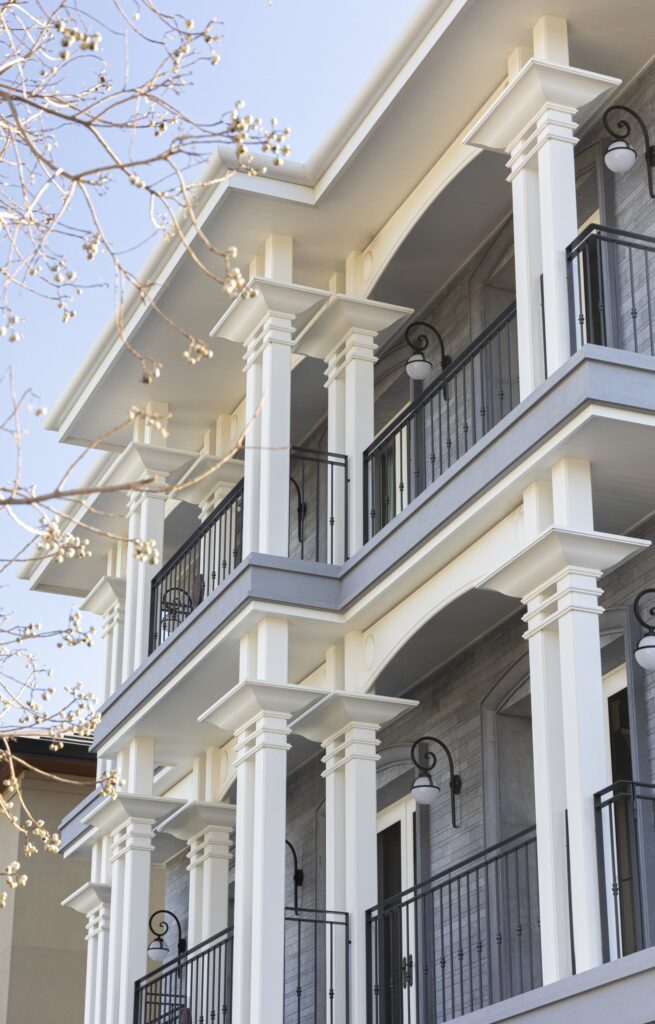 Columned South Perth façade viewed through tree branches